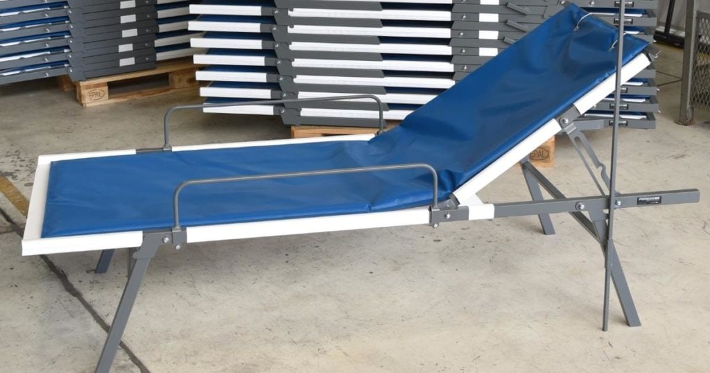 Blue hospital cot made with Snyder Manufacturing fabric
