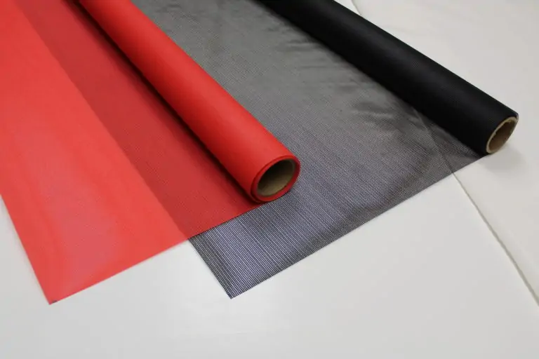 Snyder Manufacturing's PVC coated mesh fabric rolls in black, red and white